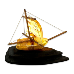 Amber souvenir on a wooden stand «Ship»