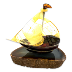 Amber souvenir on an agate stand «Ship»