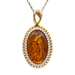 Gold-plated pendant with amber and zircons