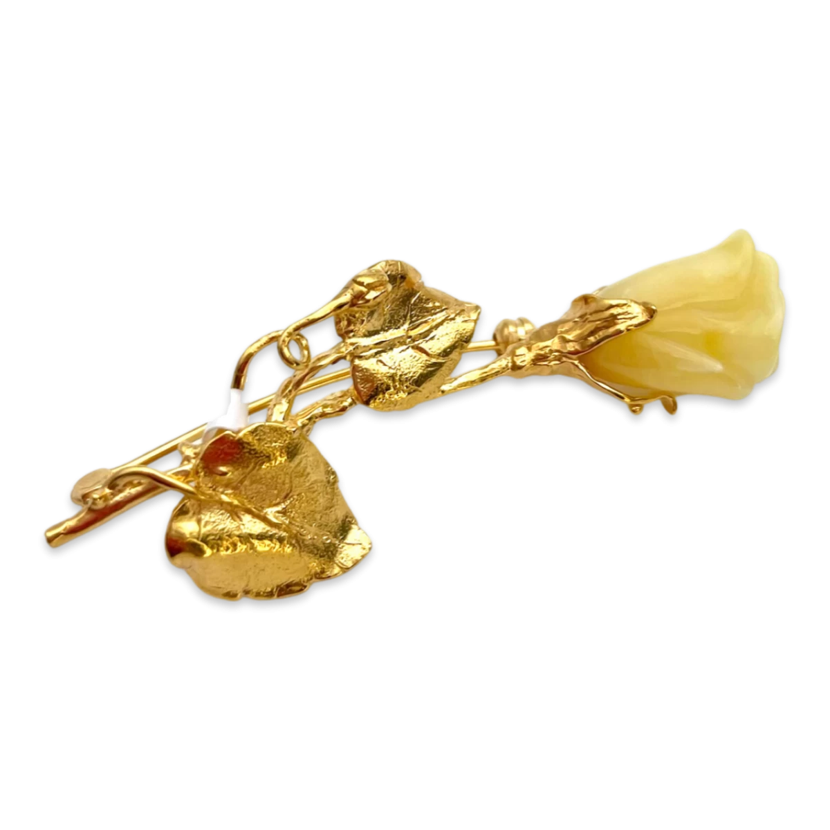 Amber Rose, Goldplattierte Brosche