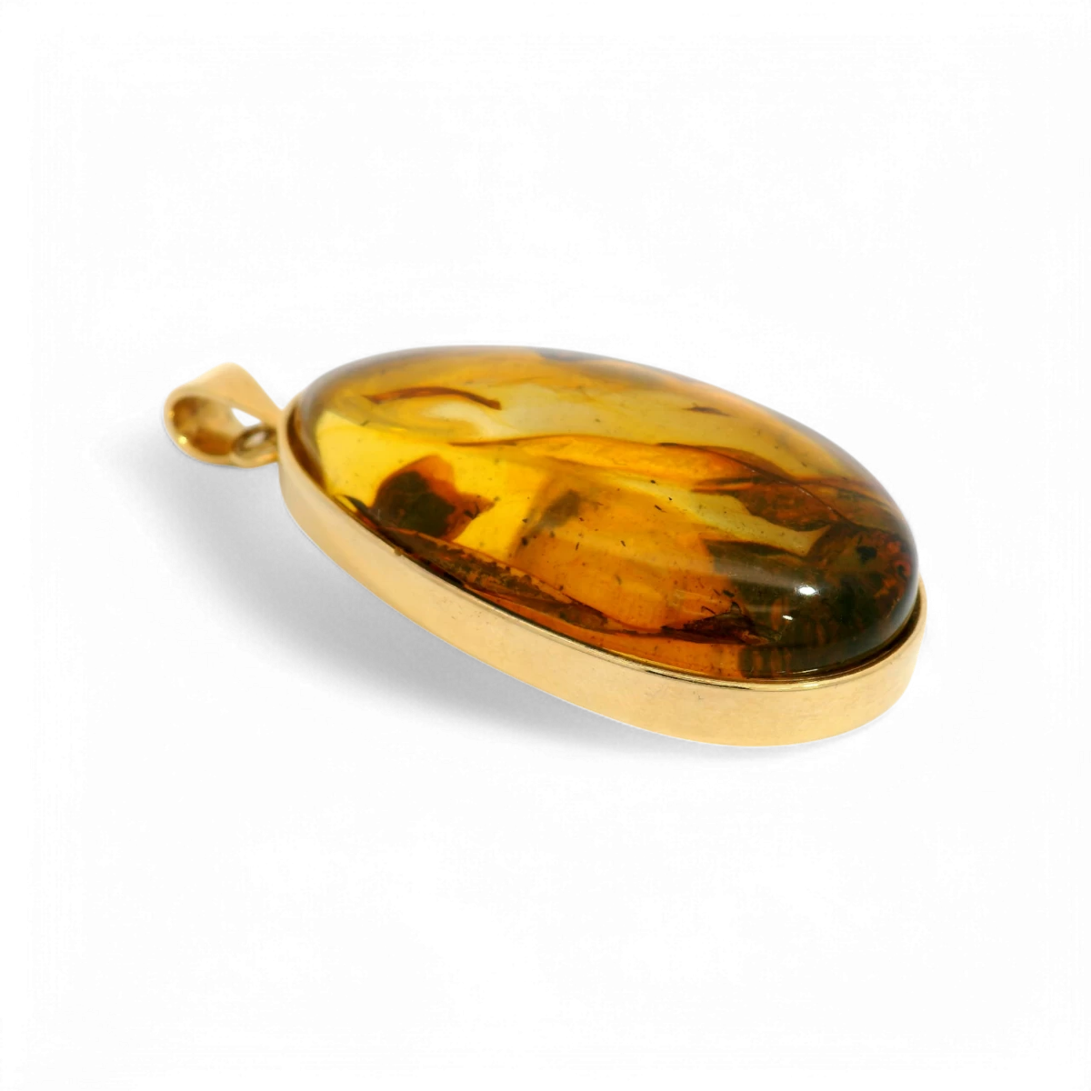 Позолочений бурштиновий кулон