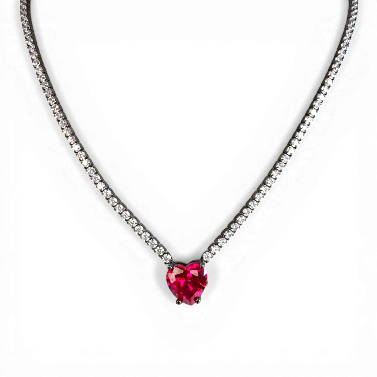 Tennis necklace with white zircon and synth ruby heart