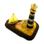 Amber souvenir on a wooden stand «Lighthouse and Ship»