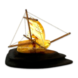 Amber souvenir on a wooden stand «Ship»