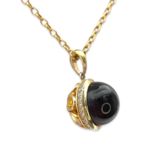 Gilded amber pendant