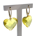 Gilded earrings with faceted amber