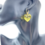 Gilded earrings with faceted amber