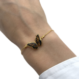 Pulsera de ámbar bañada en oro Mariposa