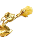 Gold-plated brooch with amber Rose