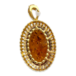 Gold-plated pendant with amber and zircons