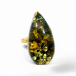 Gold plated ring with green amber