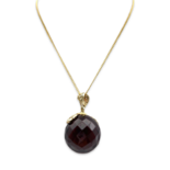 Large amber pendant with gold-plated chain