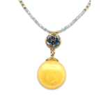 Necklace with amber and topaz