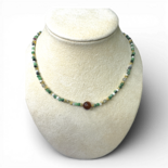 Necklace with amber honey, labradorite, zoisite ruby and howlite