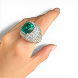 Ring mit Pavé-Kissenstein mit Paraiba-Glas und weißem Zirkon