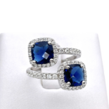 Срібна каблучка з блакитними цирконами