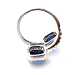 Срібна каблучка з блакитними цирконами