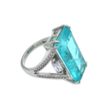 Silver ring with Paraiba and zircons