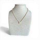 Tennis necklace with button pendant and white zircon