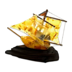 Amber souvenir on a wooden stand «Ship»