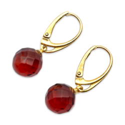 Gilded earrings with faceted amber