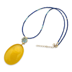 Necklace with amber and topaz