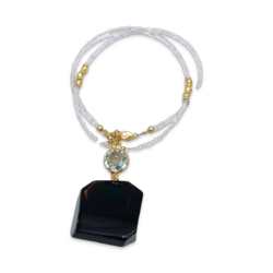 Collier avec ambre noire et topaze