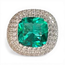 Ring mit Pavé-Kissenstein mit Paraiba-Glas und weißem Zirkon