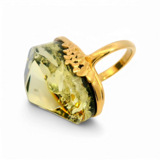 Gold plated ring with green amber