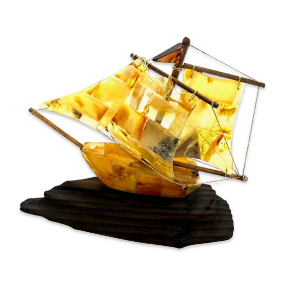 Amber souvenir on a wooden stand «Ship»