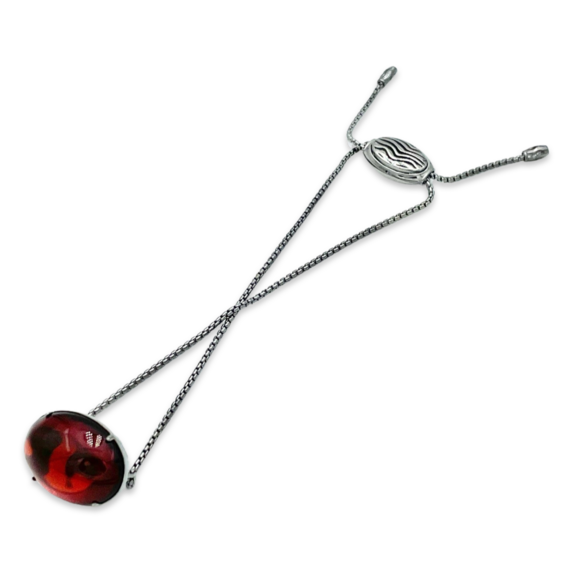 Silver bracelet with red amber