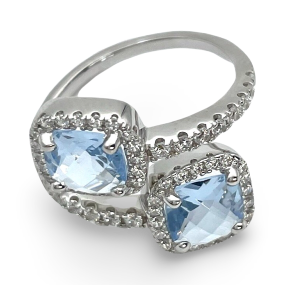 Silver ring with blue zircons