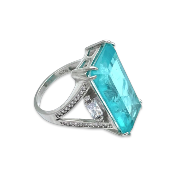 Silver ring with Paraiba and zircons